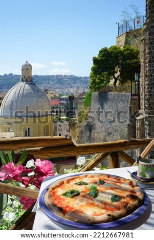 Pizzeria overlooking Naples city, Italy
