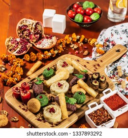 Pkhali, traditional Georgian dish of chopped and minced vegetables, made of cabbage, eggplant, spinach, beans, beets and combined with ground walnuts, vinegar, onions, garlic, pomegranate and herbs - Shutterstock ID 1337893292