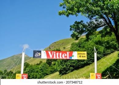 PLA D'ADET, FRANCE - JULY 23: A Informative Banner About The Finish Line In The Tour De France. The Tour Is The Most Important Cycling Race In The World. July 23, 2014 In Pla D'Adet, France 