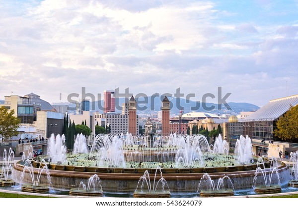 Placa de Espana -\
Magic Fountain of Montjuic and Venetian Towers, famous square City\
Center Barcelona, Spain
