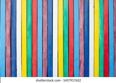 Placard of colorful  wooden planks as background . Full frame shot of multi colored wall .