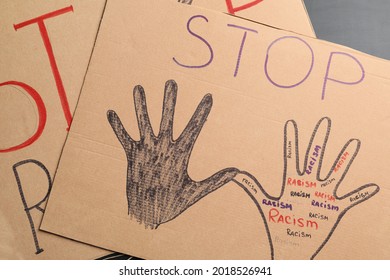 Placard and text STOP RACISM  top view