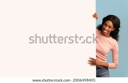 Similar – Brunette surfer woman with top and bikini kissing surfboard