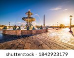 The Place de la Concorde, one of the major public squares in Paris, France and the north fountain, devoted to the rivers at golden hour.