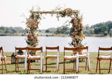 A place for a wedding ceremony on the street. Decorated wedding venue. - Shutterstock ID 2133480877