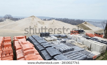 A place where materials for infrastructure and superstructure construction, roadside paving stones and paving stones are stored.