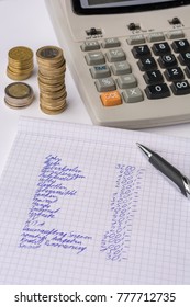 Placement Of Income And Expenditure Of A Private Household In German With Calculator And Stacked Coins In The Background