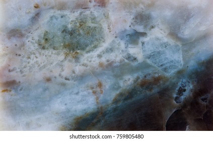 Plagioclase Feldspar Silicate Mineral Stone With Beryl Beryllium Aluminium Cyclosilicate. White Green Brown Colored Stony Background Macro View