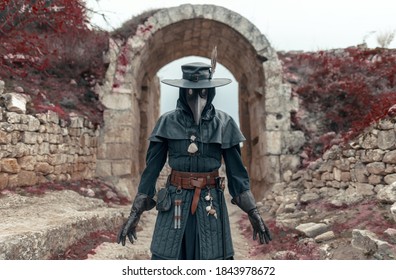 The Plague Doctor At The Cemetery Gates