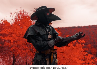 The Plague Doctor In The Red Forest Of The Middle Ages
