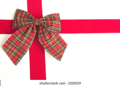 Plaid Bow And Red Ribbon On White Background