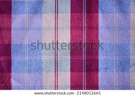 Plaid and checkered loincloth It is a local fabric in the northeastern region of Thailand. can be used as a background image