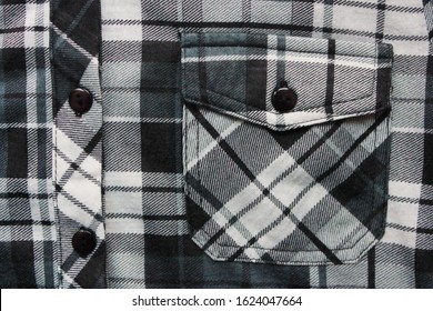 Plaid Shirt Front Pocket With Buttons Close Up View. Casual Lifestyle Clothing Design, Trendy Flannel Shirt Detail With Buffalo Check Tartan Pattern 