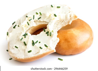 Plain Bagel Spread With Cream Cheese And Chives, Bite Missing. Isolated.