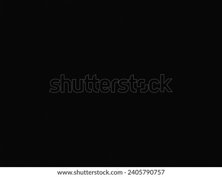 A plain black texture is used for the wallpaper. Black background supports illustrations. Simple black color for use as a background. Plain black still photography.
