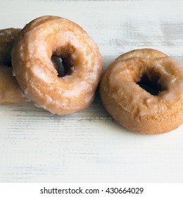 Plain Cake Donut On A White Washed Table. 