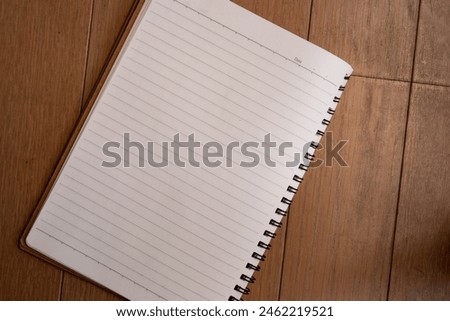 A plain notebook on the table