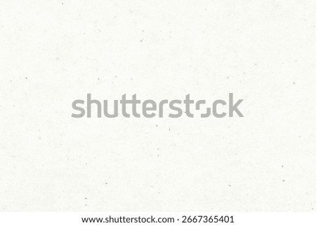 Plain off-white paper with tiny specks