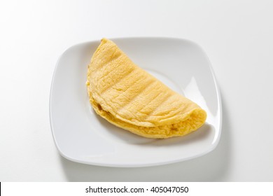 Plain Omelette On A White Plate