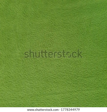 Plain polyester fleece fabric texture in green