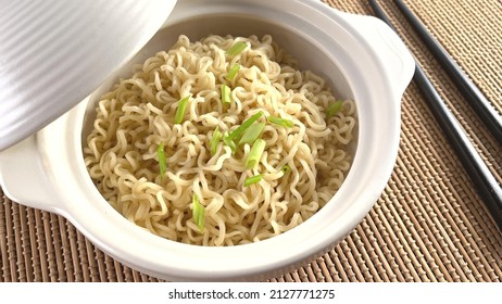 Plain Ramen Noodles Served On White Bowl With Lid