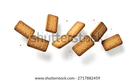 Plain rectangular biscuits shown flying in mid-air, photographed in top-view flat lay against a bright white background.