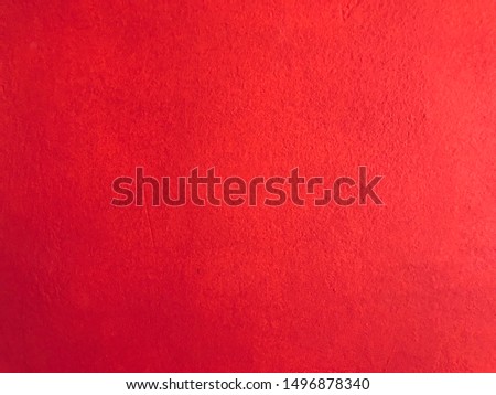 Plain red wall background coarse texture 