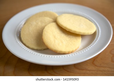 Plain Sugar Cookies On A White Plate, Side View