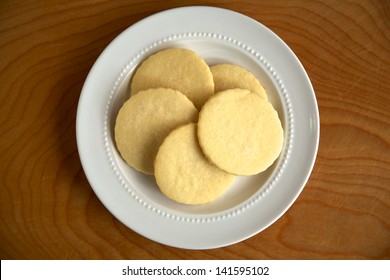 Plain Sugar Cookies On A White Plate, From Overhead