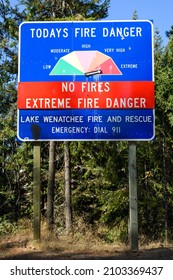 Plain, WA, USA - September 08, 2021; Sign Indicating Todays Fire Danger Level Is Extreme And No Fires Permitted With Emergency Contact Details