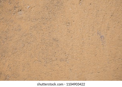 A plain wall texture with some dirt on it. and scrathces