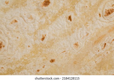 Plain Wheat Tortilla Wraps. Spanish Or Mexican Circular Unleavened Flatbread From Wheat Flour. Ingredient For Cooking Fast Food Or Snack. Closeup, Texture Background