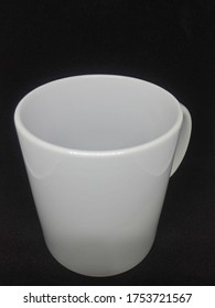 A Plain White Mug Photo Appears From The Top