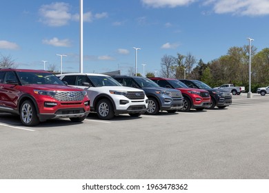 Plainfield - Circa April 2021: Ford Explorer display at a dealership. Ford offers the Explorer in a base model, XLT, Limited, ST, King Ranch and Platinum version.