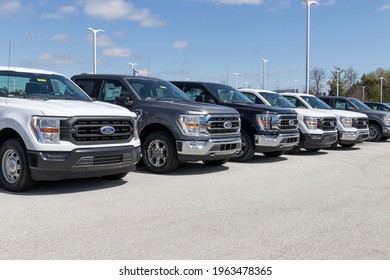 Plainfield - Circa April 2021: Ford F150 display at a dealership. The Ford F-150 is available in XL, XLT, Lariat, King Ranch, Platinum, and Limited models.