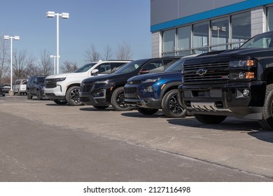 Plainfield - Circa February 2022: Chevrolet truck and SUV display at a dealership. Chevy offers gasoline, electric, and hybrid electric drive options.