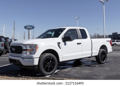 Plainfield - Circa February 2022: Ford F-150 display at a dealership. The Ford F150 is available in XL, XLT, Lariat, King Ranch, Platinum, and Limited models.