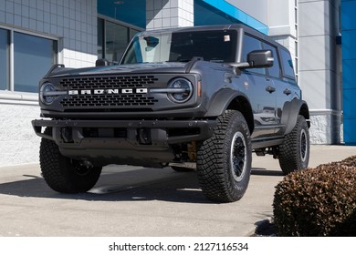 Plainfield - Circa February 2022: Used Ford Bronco display at a dealership. With supply issues, Ford is buying and selling many pre-owned cars to meet demand.
