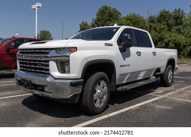 Plainfield - Circa July 2022: Chevrolet Silverado 2500HD display at a dealership. The Chevy Silverado 2500HD is available with gas or diesel engines.