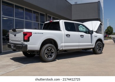 Plainfield - Circa July 2022: Ford F-150 Lightning Frunk display. Ford offers the F150 Lightning all-electric truck in Pro, XLT, Lariat, and Platinum models.