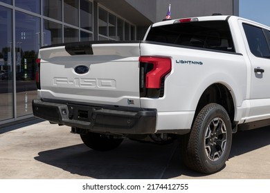 Plainfield - Circa July 2022: Ford F-150 Lightning display. Ford offers the F150 Lightning all-electric truck in Pro, XLT, Lariat, and Platinum models.