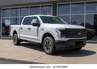 Plainfield - Circa July 2022: Ford F-150 Lightning display. Ford offers the F150 Lightning all-electric truck in Pro, XLT, Lariat, and Platinum models.