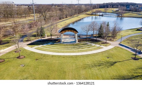 PLAINFIELD, IL, USA - MARCH 19, 2019: A drone / aerial view of Settler's Park in downtown Plainfield with a beautiful pavilion for events and entertainment.