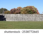 The Plains Abraham in Quebec city with old architecture. Autumn landscape in a park. Ancient architecture and old fortification. Outdoor activities and travel destination in Quebec and Canada.