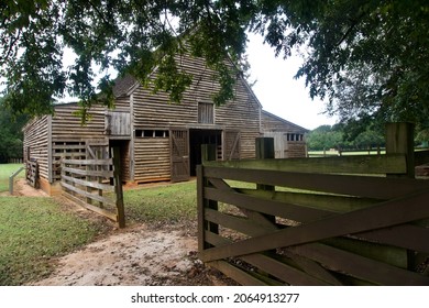 Plains, Georgia -2021: Jimmy Carter National Historic Site. Boyhood Farm. Carter Family Farm. Barn With Wooden Fence In Archery, Georgia. 