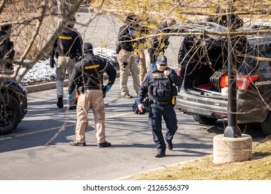 Plainsboro, New Jersey - 02-16-2022: Law enforcement police investigating crime scene outdoors