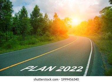 Plan 2022, Concept Photo Of Asphalt Road. 2022 Year Planner Or Calendar Cover With Summer Forest And Road. Optimistic Landscape With Sun Dawn On Road Ahead. New Year Banner Template. Scenic Road Card