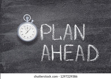 plan ahead phrase written on chalkboard with vintage precise stopwatch