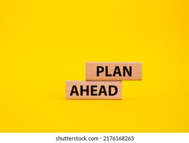 Plan Ahead Symbol. Wooden Blocks With Words Plan Ahead. Beautiful Yellow Background. Business And 'Plan Ahead' Concept. Copy Space.