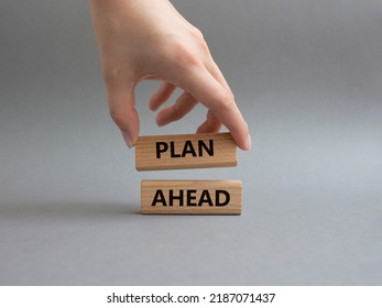 Plan Ahead Symbol. Wooden Blocks With Words Plan Ahead. Beautiful Grey Background. Businessman Hand. Business And 'Plan Ahead' Concept. Copy Space.